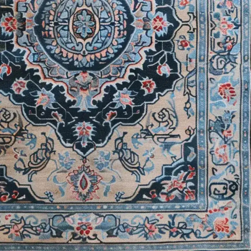 Close-up view of the Timeless Treasure Hand Tufted Rug, showcasing intricate vintage patterns in rich blues and reds, perfect for adding a touch of elegance to any living room or dining room. This wool rug serves as a stylish area rug, enhancing the beauty of your dining room carpets.
