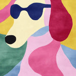 Vibrant hand-tufted area rug, featuring a playful abstract design of a dog with sunglasses in bold colors. Perfect for adding a contemporary touch to large living rooms, this wool rug combines style and comfort for the ultimate chic look.