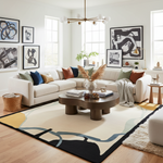 Modern living room with a sectional sofa, coffee table, an abstract wool rug, and abstract art on the walls.