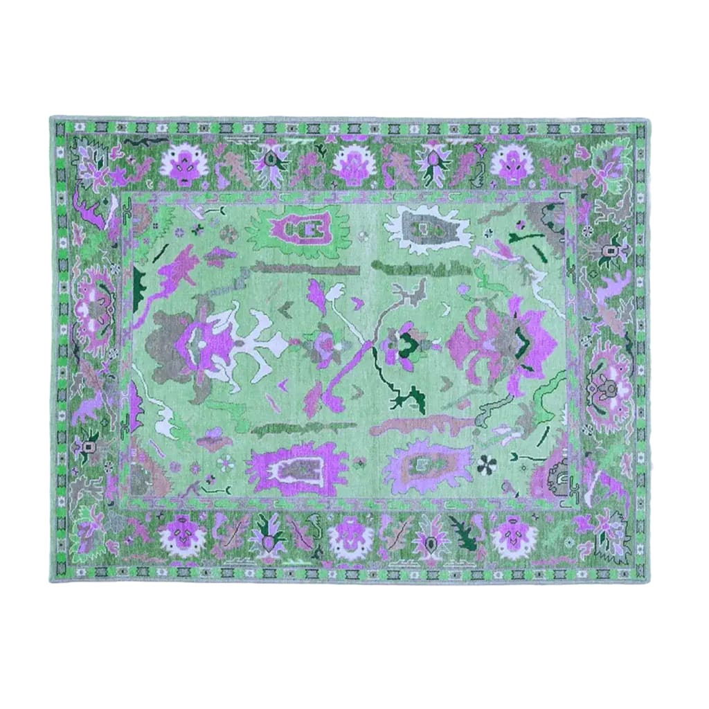 Beautiful traditional floral hand-tufted wool area rug in green, perfect for a living room setting. The intricate design features vibrant floral patterns, ideal for adding a touch of elegance to any living room. This 8x10 wool rug combines style and comfort, making it a great choice for area rugs in the living room.