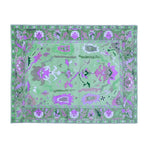 Beautiful traditional floral hand-tufted wool area rug in green, perfect for a living room setting. The intricate design features vibrant floral patterns, ideal for adding a touch of elegance to any living room. This 8x10 wool rug combines style and comfort, making it a great choice for area rugs in the living room.