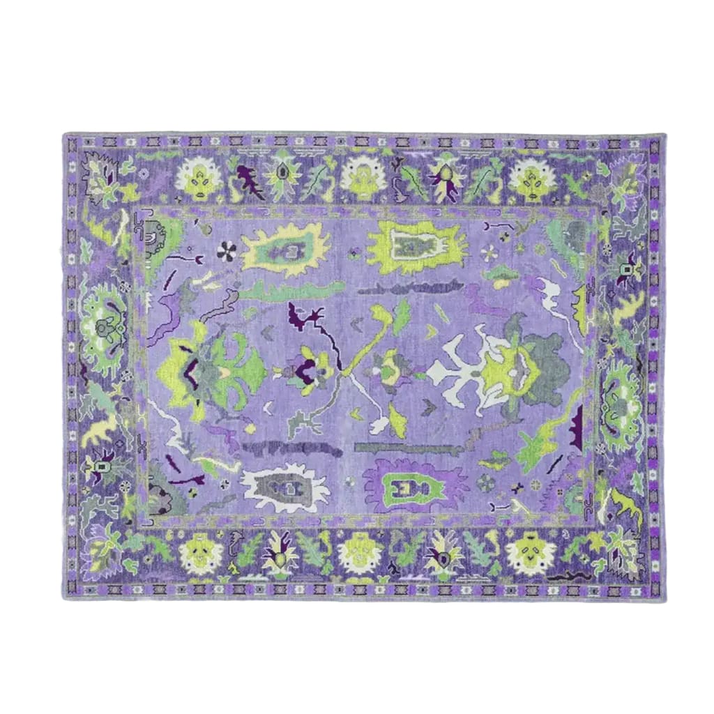 A vibrant Traditional Floral Hand Tufted Wool Rug in purple, showcasing intricate floral patterns. Perfect for adding a touch of elegance to your living room or office space. This area rug combines artistry and comfort, making it an ideal choice for rugs for living rooms or offices.
