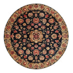 Traditional Whirl Hand Tufted Round Rug featuring an intricate floral pattern in rich colors, perfect as a vintage wool rug for the bedroom or as a large area rug. This elegant round rug adds warmth and style to any space, making it an ideal choice for bedroom rugs.