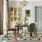 Elegant living room featuring a Tranquil Garden Hand Tufted wool rug with a vibrant floral design, adding a touch of nature to the space. This area rug beautifully complements the modern dining setup, making it an ideal choice for area rugs in living rooms.