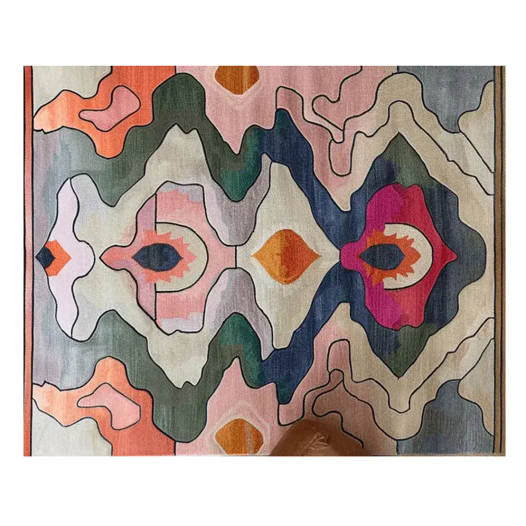 A vibrant and contemporary hand-tufted wool area rug featuring an abstract design with colorful patterns in shades of pink, orange, green, and blue. Perfect for large living rooms or office spaces, this rug adds a modern touch to any area.