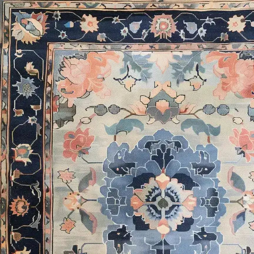 Close-up of the Tranquil Tapestry Hand Tufted Rug showcasing its intricate floral design. This elegant area rug, perfect for dining rooms and bedrooms, features a harmonious blend of soft wool with vibrant colors in a floral pattern, ideal for enhancing any dining room or bedroom space.