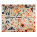This hand-tufted wool area rug, titled 'Tree of Vibrant Blooms', showcases a stunning floral design with colorful flowers sprawled across its surface. Perfect for adding a touch of elegance to any living room, this floral rug features a lively mix of reds, oranges, and yellows on a neutral background, embodying both style and comfort. Ideal for those seeking rugs for the living room that combine beauty with practicality.