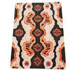 Vibrant Tribal Tapestry Hand Tufted Area Rug with bold orange and black abstract patterns, perfect for adding a contemporary touch to dining room decor. Ideal as a wool rug or dining room carpet, this piece is also suitable for office spaces seeking modern flair.