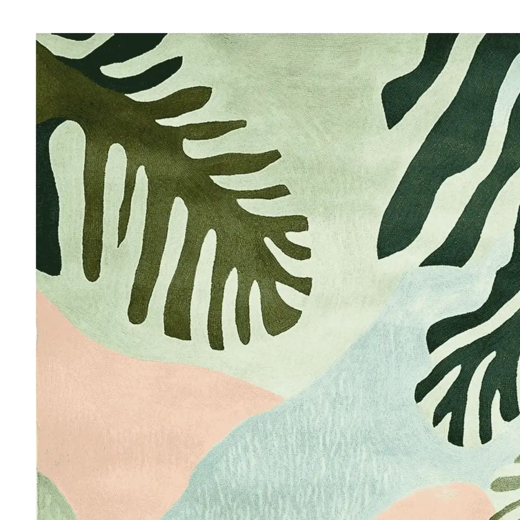 Close-up of the Tropical Bloom Dance Hand Tufted Area Rug, showcasing its abstract contemporary design with lush green and soft pink hues. Perfect for adding a modern touch to large living rooms, this wool rug combines style and comfort.