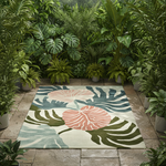 Floral patterned rug on a stone patio surrounded by potted plants