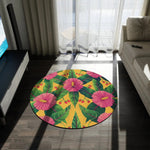 tropical hibiscus and cherry floral round rug on dark hardwood floor