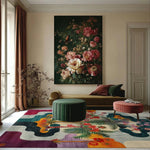Tropical Oasis rug with bold florals and ferns in a refined room with daybed and velvet ottomans
