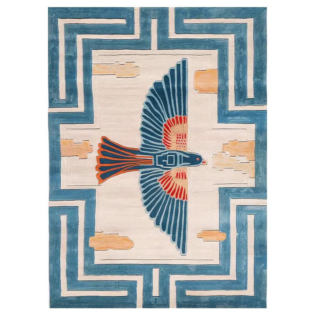 The Tropical Phoenix Threshold Hand Tufted Wool Rug showcases a striking phoenix design with vibrant blues and oranges. Perfect for enhancing your living room, this 8x10 area rug offers a blend of artistry and comfort, making it an ideal choice for those seeking unique living room rugs.
