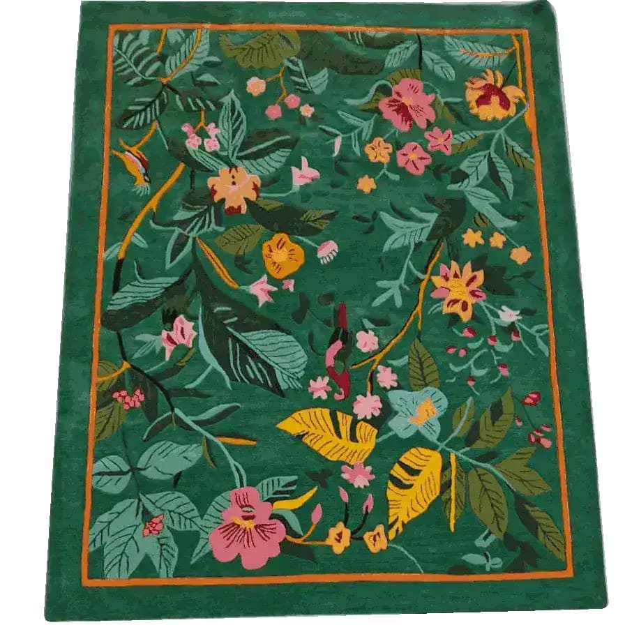 Vibrant Tropical Treasure Hand Tufted Wool Rug measuring 4 x 6 ft, showcasing a lush floral design. Perfect for large living rooms, this area rug features an exquisite array of colorful flowers and leaves set against a rich green background, offering a touch of nature to your living room decor.
