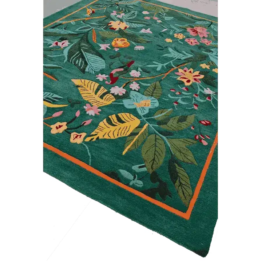 Vibrant Tropical Treasure Hand Tufted Wool Area Rug, ideal for large living rooms. This 4 x 6 ft floral rug features lush green tones with intricate floral patterns, perfect for enhancing any living room space with a touch of nature.