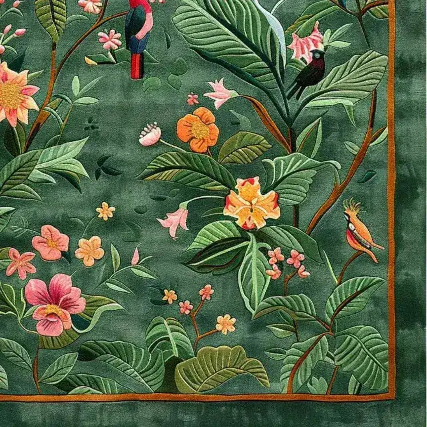 Vibrant Tropical Treasure Hand Tufted Wool Rug featuring a lush floral pattern with exotic birds on a rich green background. Perfect for adding elegance to a dining room, this large area rug brings a touch of nature indoors, making it a stunning choice for formal dining room settings.