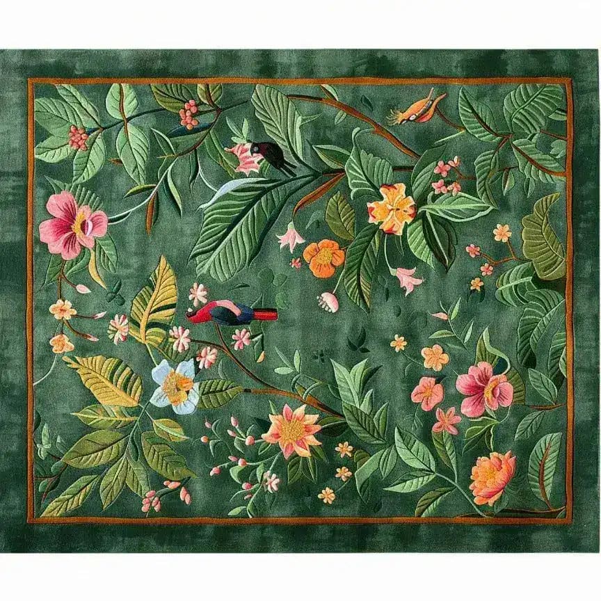 The Tropical Treasure Hand Tufted Wool Rug features a lush, green background adorned with vibrant floral patterns and tropical birds. This large area rug is perfect for enhancing the elegance of a dining room, offering a blend of color and style that complements formal dining room settings. Ideal for those seeking dining room carpets with a touch of nature-inspired design.
