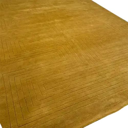 The image showcases a Turmeric Artic Geo Modern Hand Tufted Wool Rug, perfect for those seeking a contemporary rug. This large area rug, measuring 9 x 12, features a geometric pattern that adds a modern touch to any living room decor.