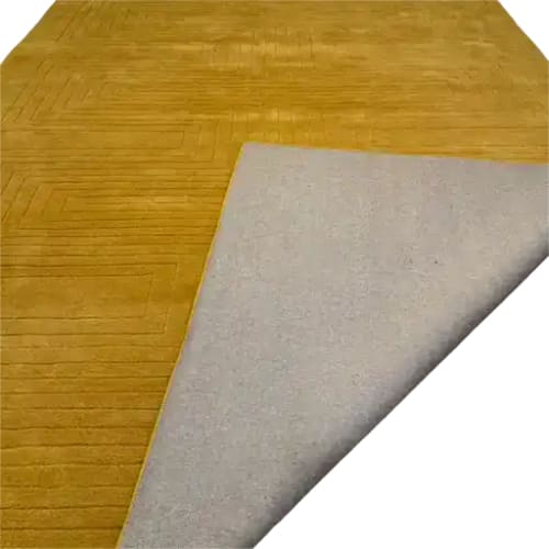 A vibrant Turmeric Artic Geo Modern Hand Tufted Wool Rug measuring 9 x 12, showcasing a contemporary design with geometric patterns. This large area rug is perfect for a living room, combining both style and comfort with its soft wool texture. The image highlights the detailed pattern and quality craftsmanship, ideal for anyone seeking a stylish contemporary rug.