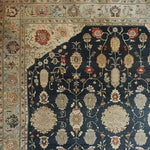 A beautifully intricate Turquoise Tradition Hand Knotted Area Rug, showcasing a rich floral design with Persian rug influences. This large living room rug features a vintage aesthetic with detailed patterns in warm tones, ideal for adding elegance to any space.