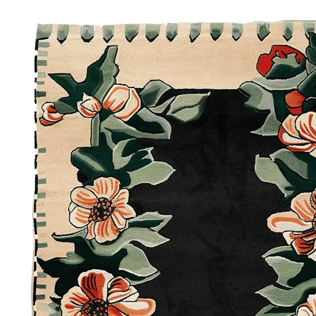 Close-up of the Twilight Rose Parade Hand Tufted Rug, showcasing vibrant floral designs in orange and green on a dark background. This wool area rug is perfect for adding a touch of elegance to living room spaces.