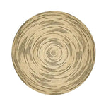 A stylish Twirly Black and Natural Round Jute Rug featuring a modern spiral design. This area rug is perfect for adding a natural touch to your living room decor.