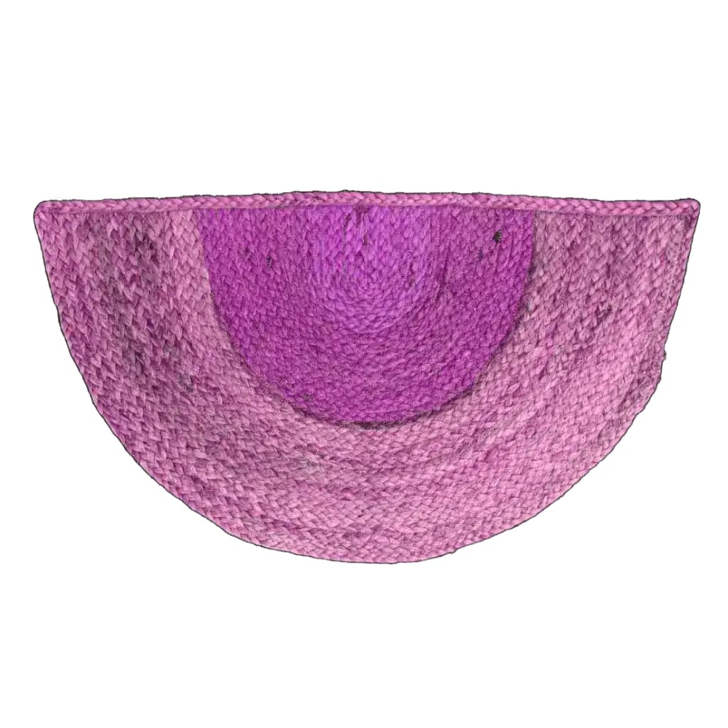 A vibrant two-toned half moon jute area rug in shades of purple. Perfect for adding a boho touch to your dining room or bedroom. This unique round rug design is ideal for formal dining room settings or as a stylish bedroom area rug.