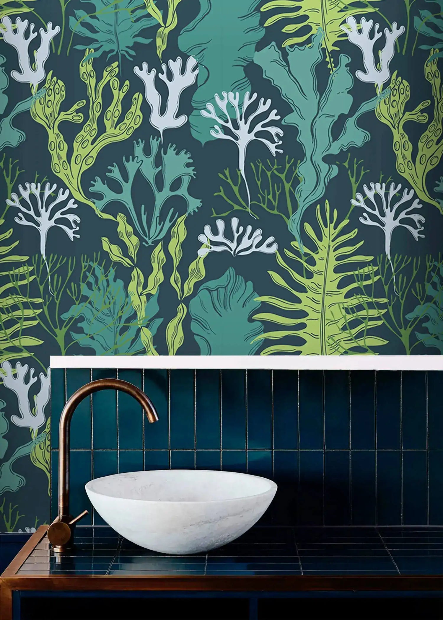 Underwater Flora Wallpaper in teal with kelp and coral above a marble vessel sink