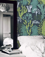 Underwater Flora Wallpaper of green and white sea plants beside a bed and black mirror