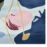 Vibrant abstract design on an area rug, featuring bold strokes of blue, pink, and gold, perfect for adding a contemporary touch to any living room. This large living room rug is crafted from soft wool, making it a plush and stylish addition to your home decor.