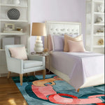 A stylish living room featuring a Unity in Hues Hand Tufted Area Rug with an abstract design in vibrant colors. The wool rug adds a contemporary touch to the space, complementing the elegant armchair and bedside decor. Ideal for those looking to enhance their living room with a square area rug.