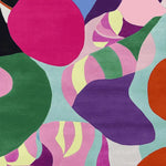 Vibrant and colorful area rug featuring abstract shapes in bold hues of pink, green, purple, and orange. Perfect for adding a touch of contemporary flair to large living room spaces, this wool rug measures 8x10 and complements modern decor.