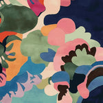 A vibrant Area Rug showcasing a colorful abstract floral pattern with lush greens, deep blues, and soft pinks. This contemporary wool rug, designed for living rooms, offers an artistic touch to any space. Ideal as a square area rug, it fits perfectly as an 8x10 living room rug.