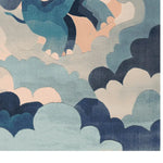Elegant Up and Away Hand Tufted Area Rug featuring an abstract cloud pattern in shades of blue and peach, perfect for elevating your living room decor. Ideal as a living room area rug, this wool rug offers a cozy and stylish touch, available in an 8x10 size.