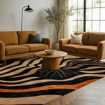 Contemporary area rug with an abstract pattern made from tufted wool, placed in a modern living room setting featuring mustard-colored sofas, a wooden coffee table, and large windows. Ideal for adding a stylish touch to living rooms and offices.