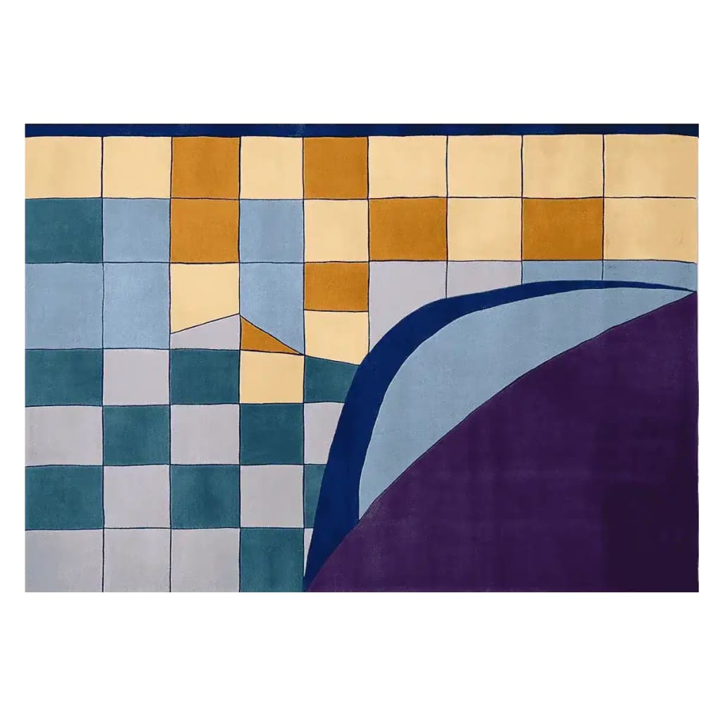 A vibrant Urban Mosaic Hand Tufted Area Rug featuring an abstract geometric pattern with blocks of blue, orange, and cream colors. This contemporary wool rug is perfect for enhancing the aesthetics of living room area rugs, adding a modern touch to your space.