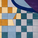 This vibrant Urban Mosaic Hand Tufted Area Rug features a contemporary design with a colorful checkered pattern. Perfect for adding a modern touch to your living room, this wool rug showcases a blend of mustard yellow, teal, and gray squares with bold curves, making it an ideal choice for those seeking stylish rugs for the living room.