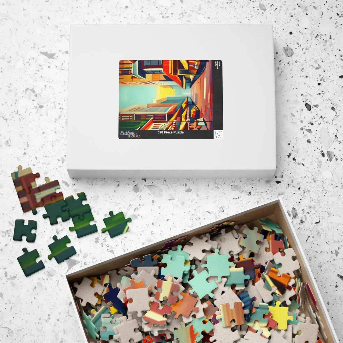 Urban Vibes 520-piece puzzle box beside open tray of scattered vivid pieces