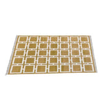 Top view of a Vegetable Dyed Indian Dhurrie Cotton Rug featuring a Medina Square pattern. This boho area rug is perfect for adding a touch of elegance to your dining room or living room. The intricate design and natural cotton material make it an ideal choice for formal dining room settings or as a stylish area rug for the living room.