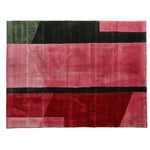 This contemporary area rug features bold geometric patterns in rich shades of red and black, perfect for adding a touch of modern elegance to your living room. The hand-tufted wool texture of this rug offers both comfort and style, making it an ideal choice for area rugs for living rooms.