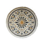 Top view of the Verdant Harmony Knotted Wool Rug, a stunning round area rug featuring intricate floral patterns in shades of yellow, gray, and black. Perfect for enhancing large living rooms with its elegant design and premium wool material.