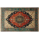 This image showcases the Verdant Haven Hand Knotted Area Rug, a striking Persian-style wool rug perfect for adding elegance to your living room. With its intricate floral patterns and vintage charm, this 8x10 rug features rich, vibrant colors including deep red, navy blue, and cream, making it an ideal centerpiece for any home decor.