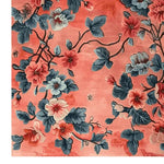 A beautifully detailed area rug featuring a vibrant floral design with pink, blue, and coral hues. Perfect for large living rooms or bedrooms, this wool rug adds a touch of elegance and comfort, ideal for an 8x10 living room setting.