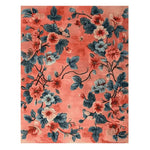 The Verdant Retreat Hand Knotted Rug is an elegant wool area rug perfect for large living rooms or bedrooms. This 8x10 floral rug features a vibrant design of lush blue and pink flowers on a warm background, adding a touch of nature and sophistication to any living space.