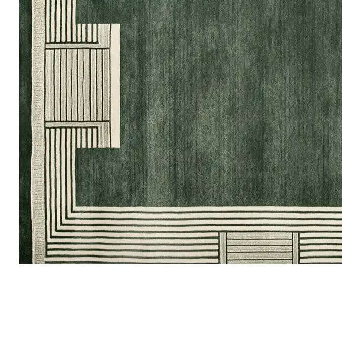 Top view of the Verdant Sanctuary Hand Tufted Wool Rug, showcasing a contemporary design with rich green tones and intricate geometric patterns. This area rug is a perfect addition to living room spaces, adding a touch of elegance and warmth.