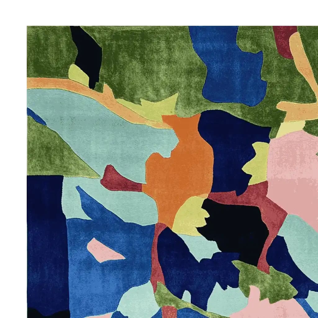 The Verdant Terrain Collage Hand Tufted Rug, a stunning area rug perfect for contemporary living room spaces. This large living room rug features an abstract design with vibrant hues of green, blue, orange, and pink, crafted from high-quality wool, adding a modern touch to any room.