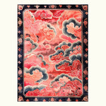 This stunning Vermilion Cloud Frame Hand Tufted Rug is an eye-catching area rug perfect for a large living room. The wool rug features an abstract design with vibrant shades of red, pink, and grey, creating a cloud-like pattern that adds a touch of elegance to any living space. Ideal for those seeking unique area rugs for the living room.