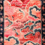Top view of the Vermilion Cloud Frame Hand Tufted Rug, a striking area rug perfect for large living rooms. Featuring a vibrant abstract design with swirling pink and red clouds, this wool rug adds a touch of elegance and warmth, making it an ideal choice for area rugs in the living room.