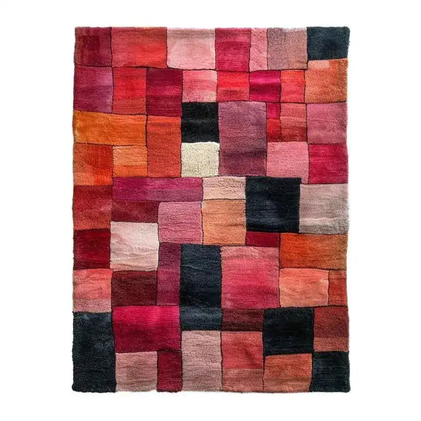 Vermilion Grid Hand Tufted Area Rug showcasing a vibrant patchwork of red, orange, and pink tones. This wool rug is perfect for adding a contemporary touch to your living room, ideal for those seeking large area rugs for a stylish and cozy atmosphere.