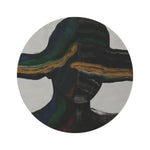 Round abstract Vibe Split rug with bold black brushstroke halves and ochre gold accent streak on cream ground, flat top-down view